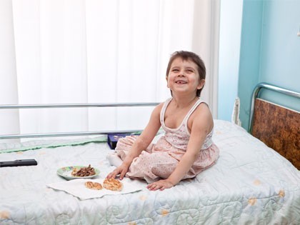 MAHAK child The playful boy playing table food and having fun